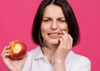 What Should I Do with Food Stuck in Gums?