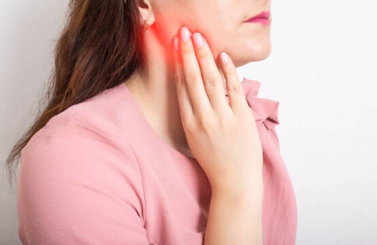 The woman has symptoms of dental infection
